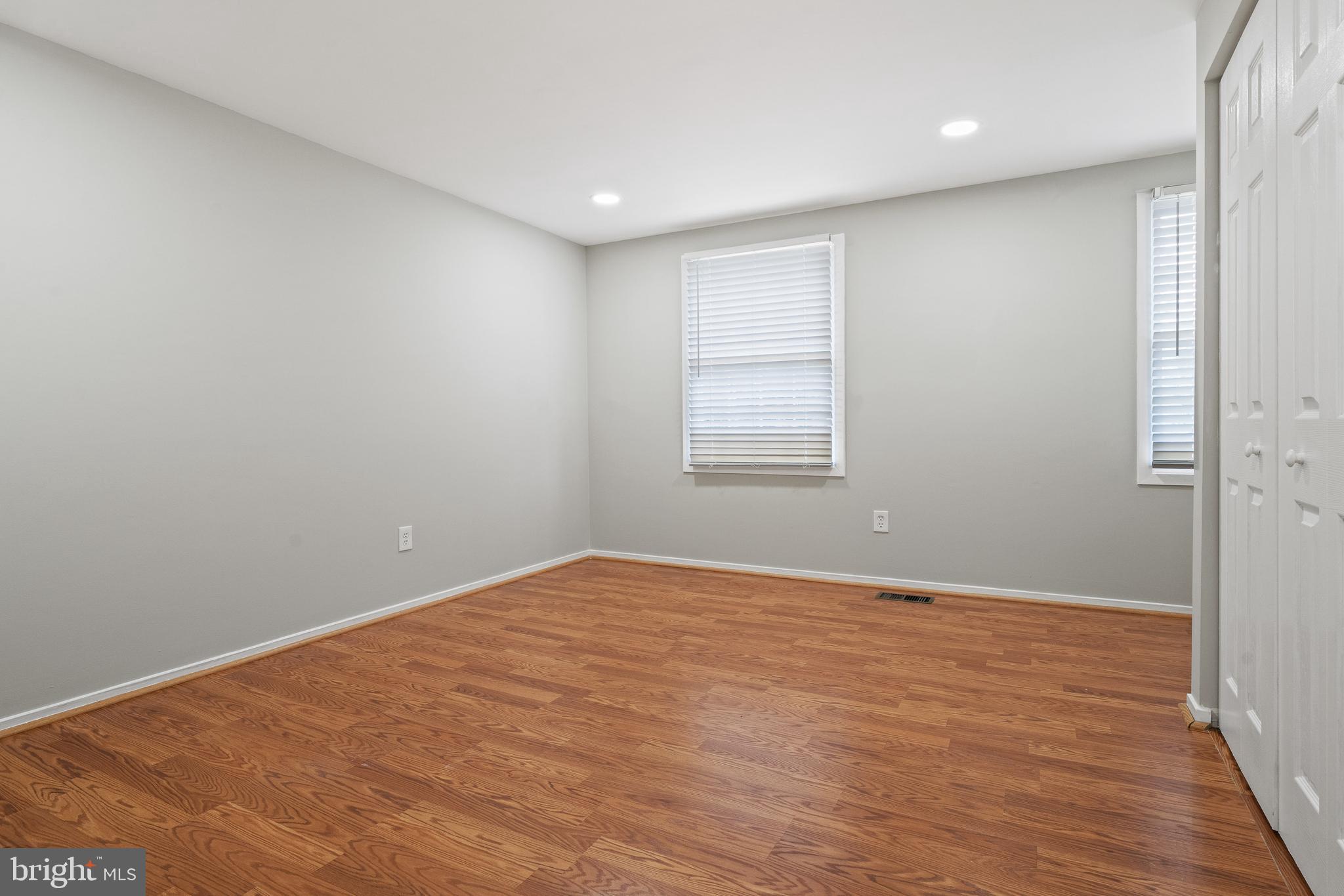 6122 Mantle Road Burke, VA 22015 - Photo 29 of 51 an empty room with windows