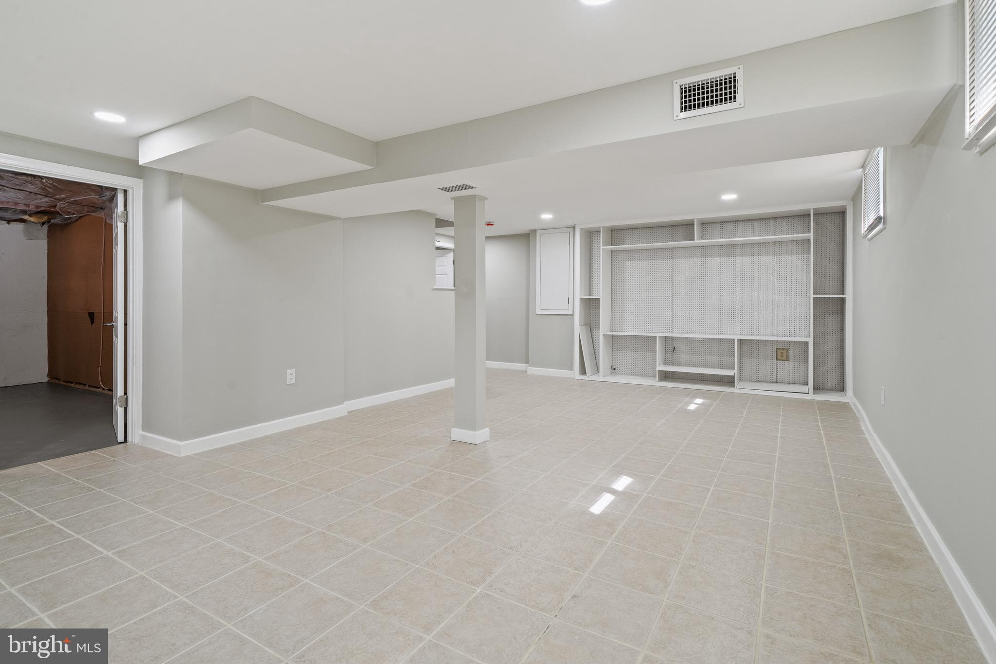 6122 Mantle Road Burke, VA 22015 - Photo 33 of 51 a view of a kitchen with a sink and a window