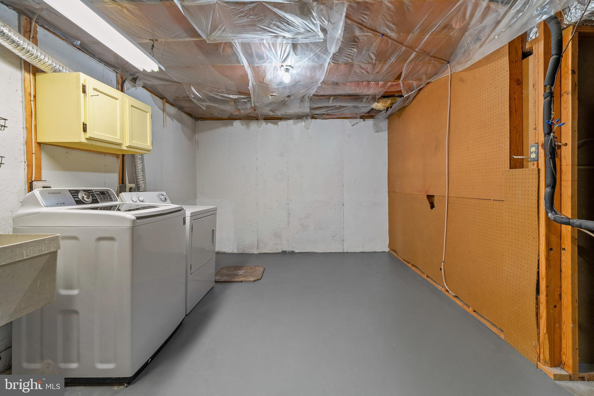 6122 Mantle Road Burke, VA 22015 - Photo 34 of 51 a utility room with dryer and washer