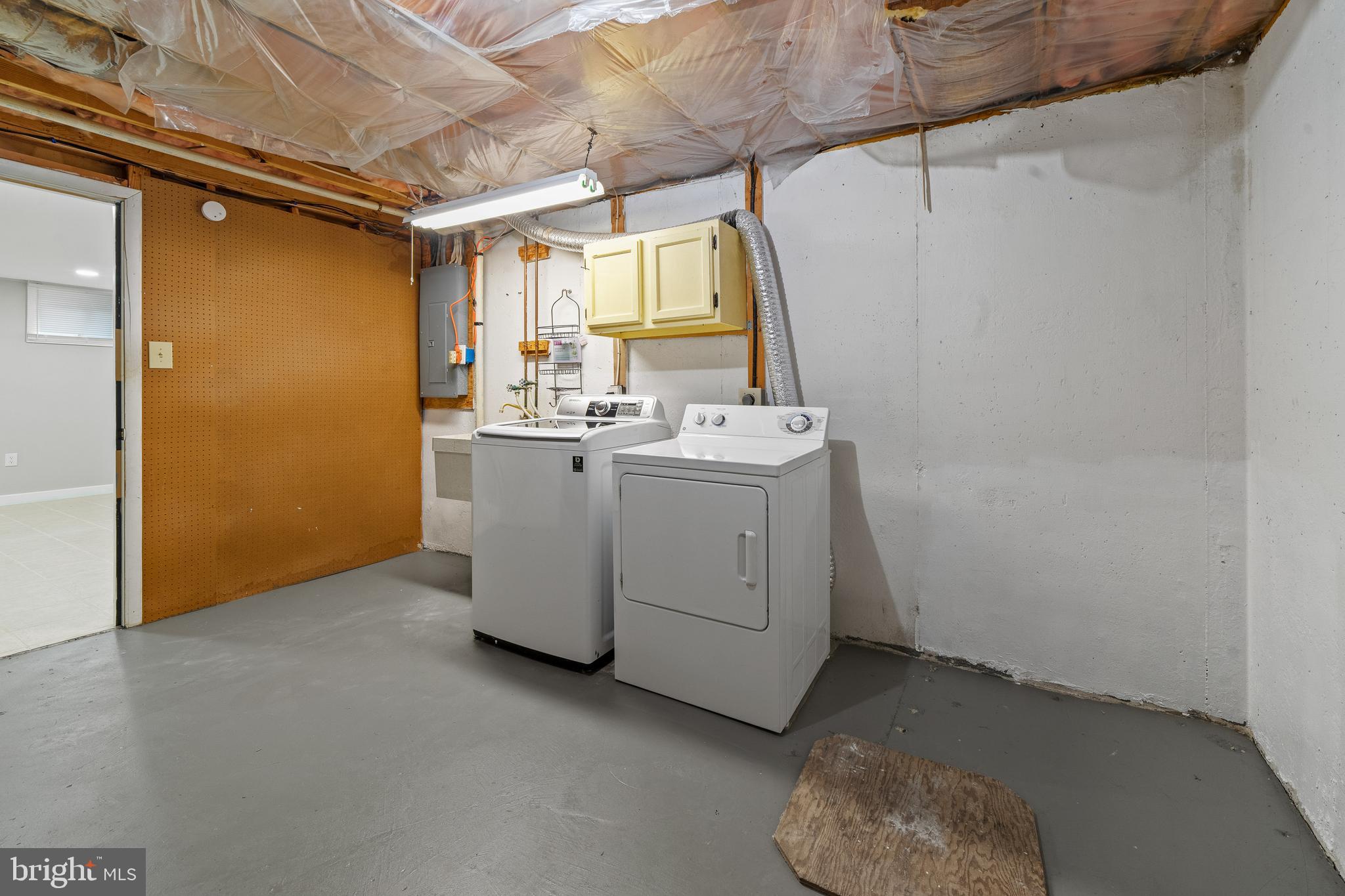 6122 Mantle Road Burke, VA 22015 - Photo 35 of 51 a utility room with dryer and washer