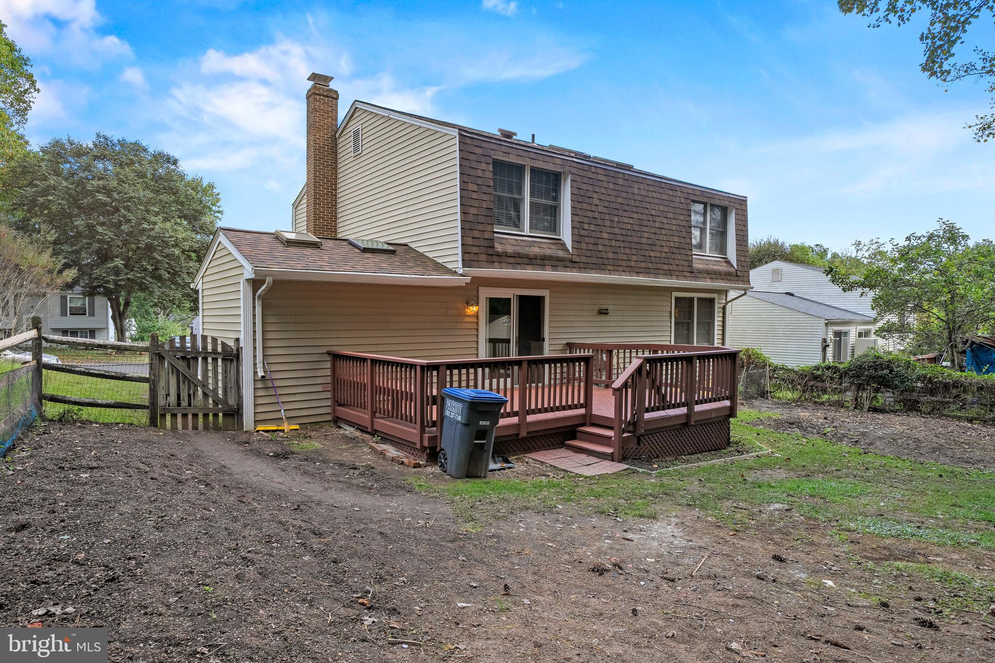 6122 Mantle Road Burke, VA 22015 - Photo 41 of 51 front view of a house with a yard