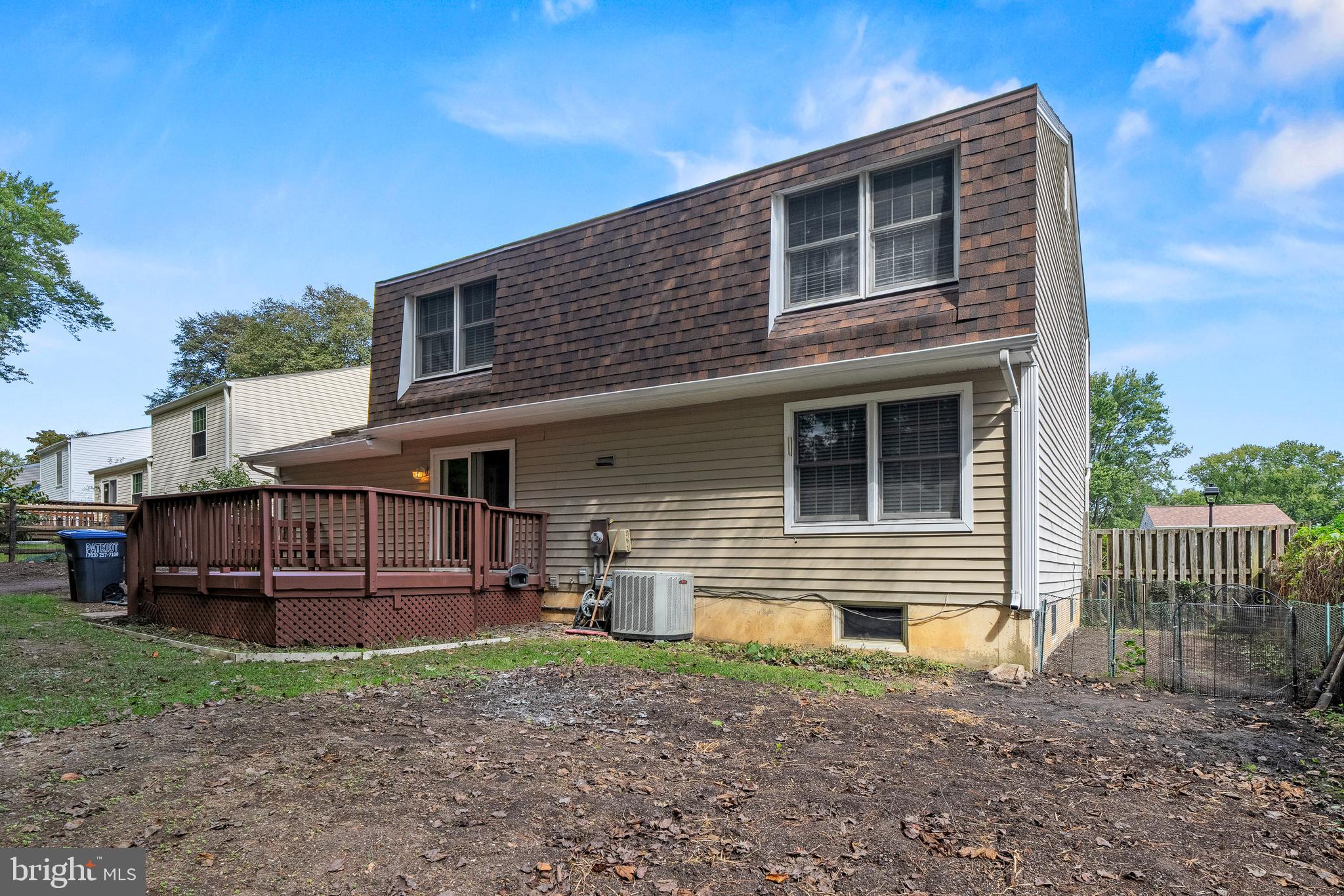 6122 Mantle Road Burke, VA 22015 - Photo 43 of 51 a view of a house with a yard