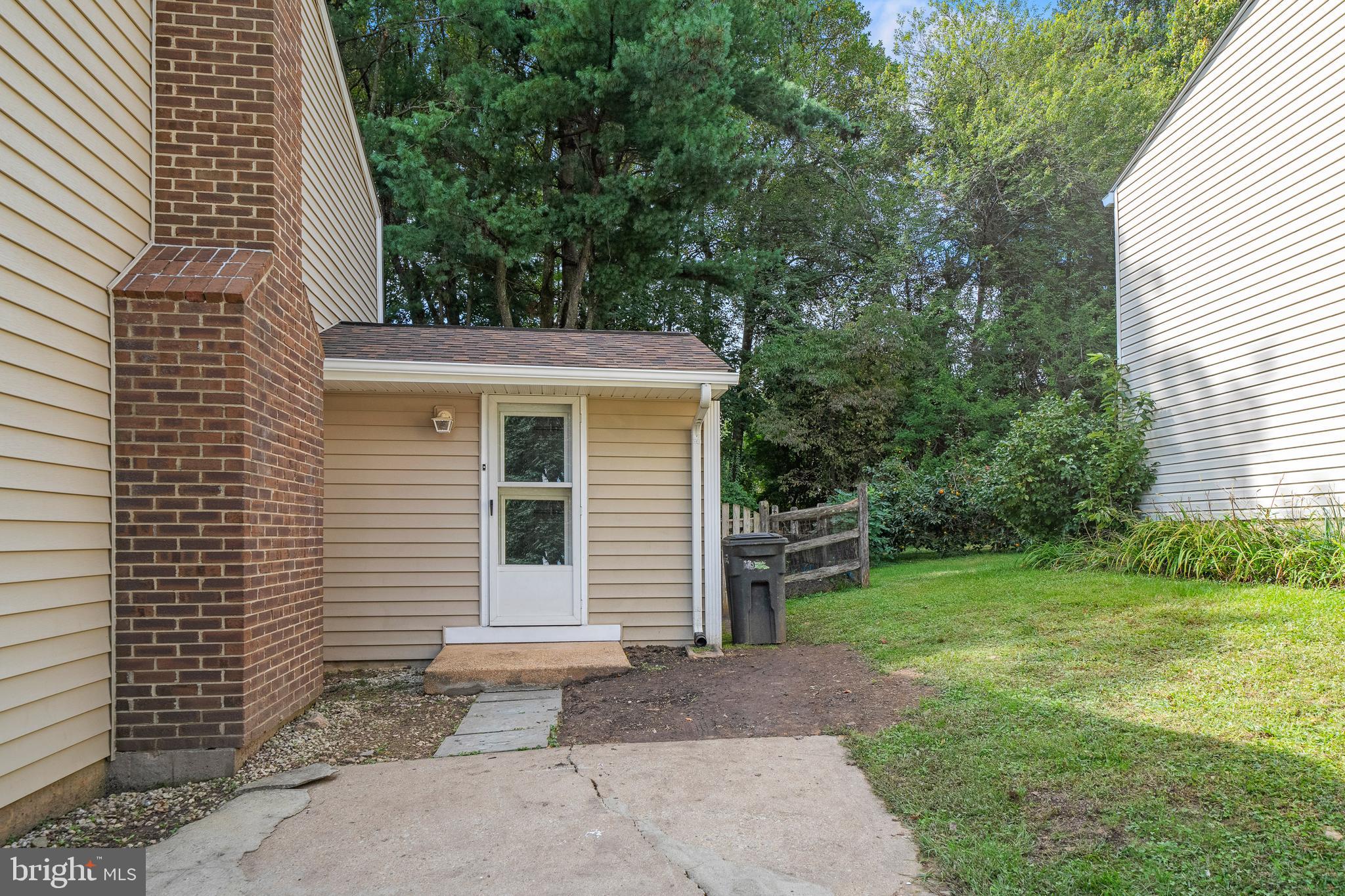 6122 Mantle Road Burke, VA 22015 - Photo 44 of 51 a view of a back yard of the house