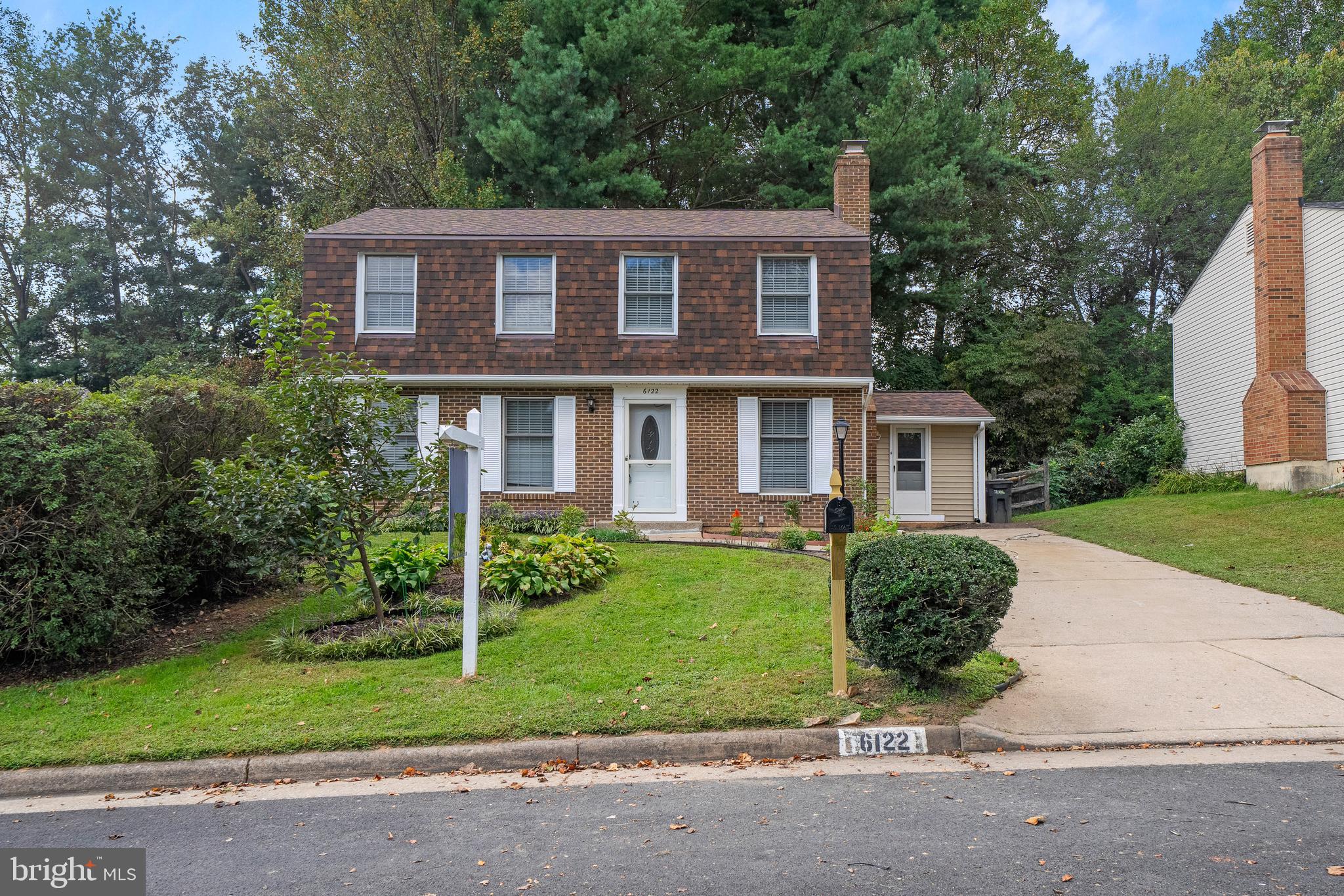 6122 Mantle Road Burke, VA 22015 - Photo 47 of 51 a view of a house with a yard