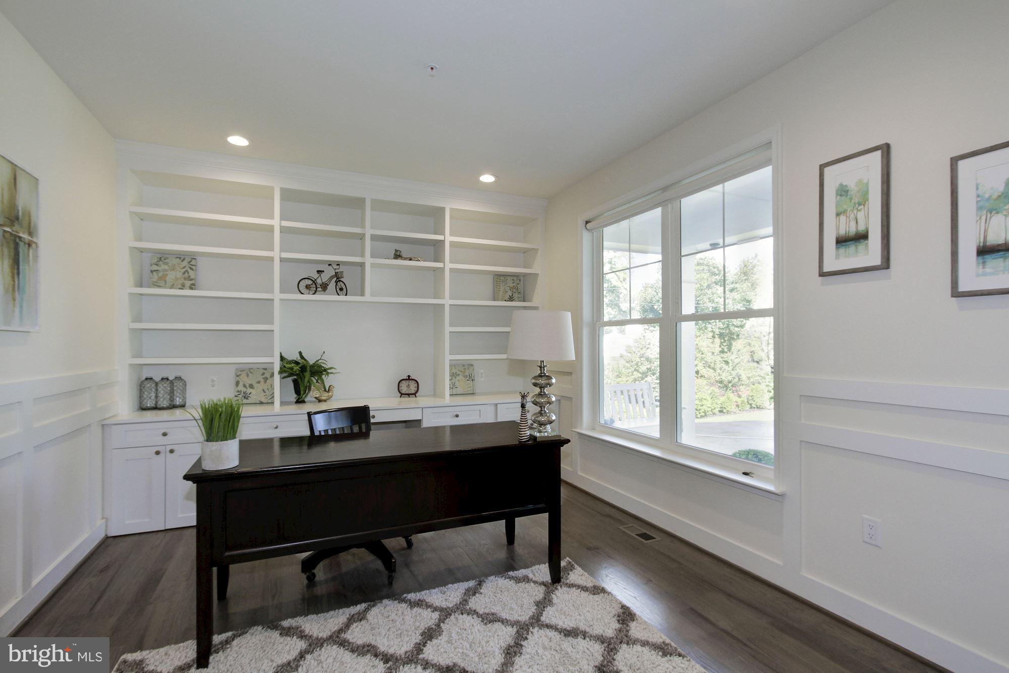 9310 Greyrock Road Silver Spring, MD 20910 - Photo 36 of 146 Study with custom cabinets and shelves