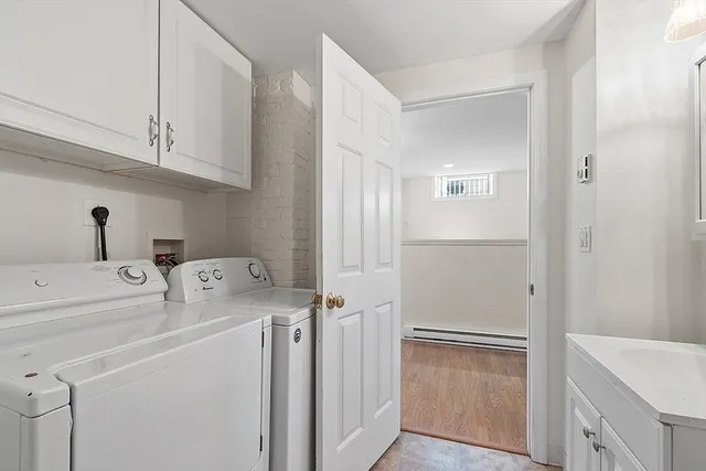 a utility room with dryer and washer