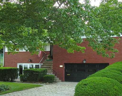 2227 Harmain Road Churchill, PA 15235 - Photo 2 of 18 Exterior Front. The level driveway is made of the signature cobblestones from Pittsburgh s past.