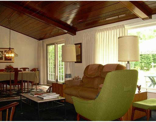 2227 Harmain Road Churchill, PA 15235 - Photo 4 of 18 Living Room. The wonderful open living room is highlighted by a glossy wainscoted vaulted ceiling, and lots of natural light.