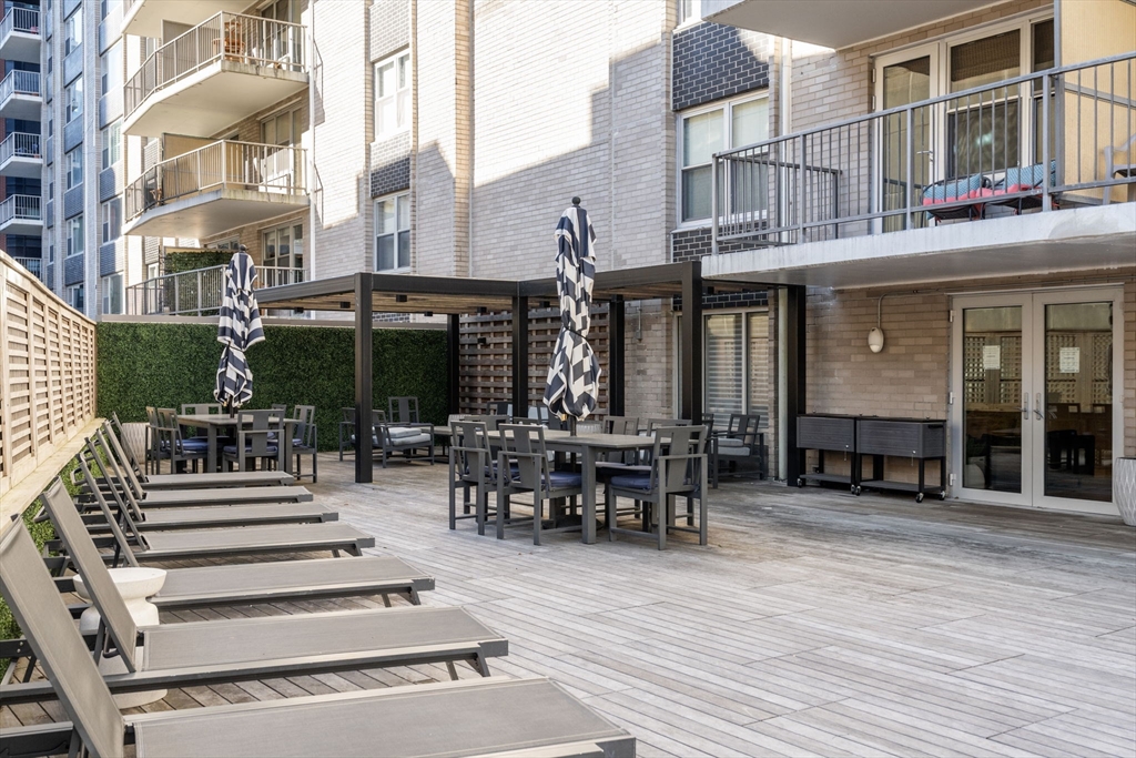 151 Tremont Street, Unit 10S Boston, MA 02111 - Photo 22 of 27 a view of a building with sitting area