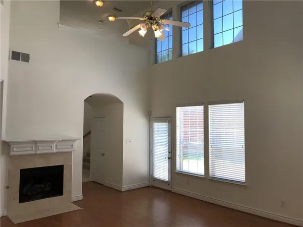 a view of livingroom and hardwood floor