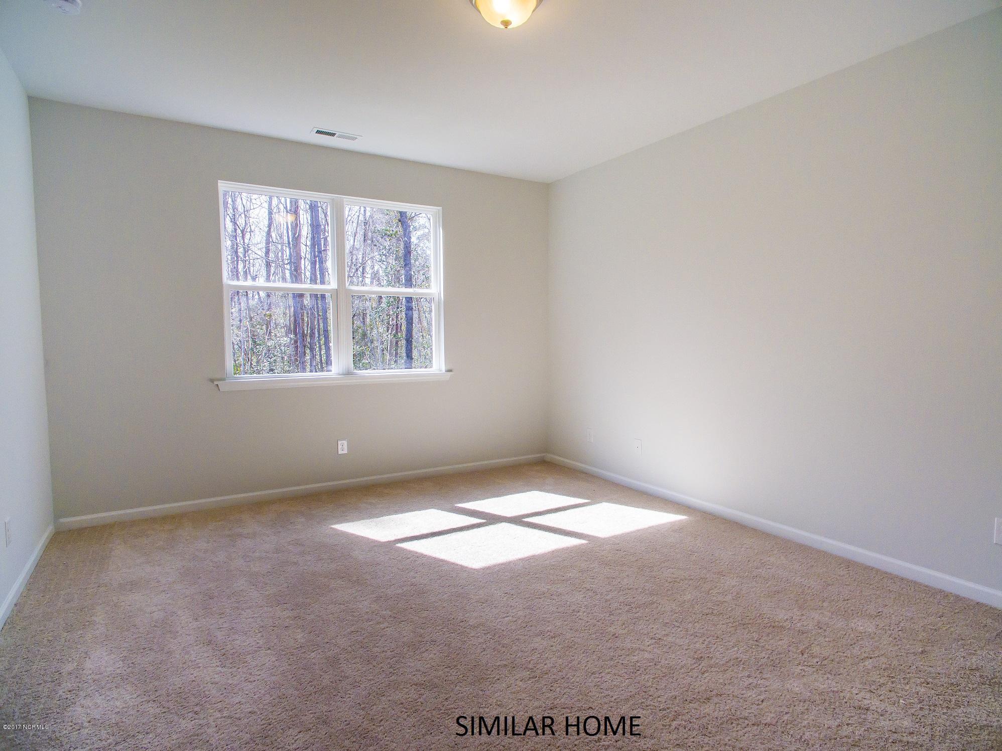 661 Morris Landing Road, Unit 5 Holly Ridge, NC 28445 - Photo 12 of 27 owners bedroom
