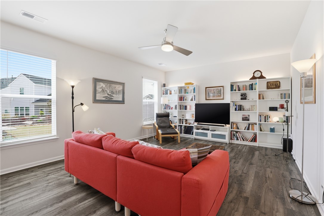 804 Spring Orchard Drive Lyman, SC 29365 - Photo 15 of 47 The bright living space features abundant natural light and ample room for comfortable living.