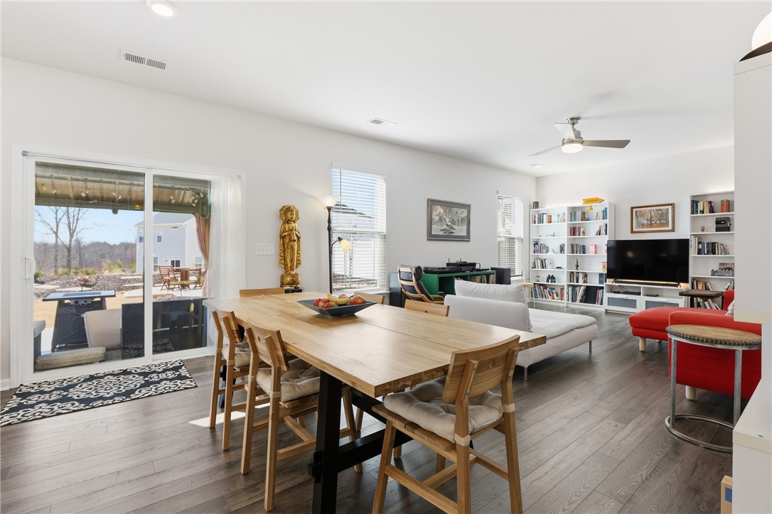 804 Spring Orchard Drive Lyman, SC 29365 - Photo 17 of 47 This bright, open concept space features ample natural light and seamless indoor-outdoor living.