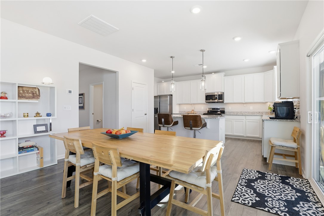804 Spring Orchard Drive Lyman, SC 29365 - Photo 20 of 47 Bright, open-concept kitchen and dining area perfect for gatherings and everyday living.