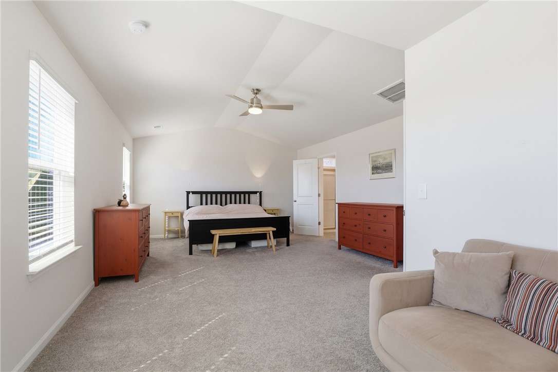 804 Spring Orchard Drive Lyman, SC 29365 - Photo 24 of 47 Light-filled primary suite featuring a private sitting area — the perfect quiet getaway for morning coffee, reading, or unwinding at the end of the day — plus two oversized walk-in closets.