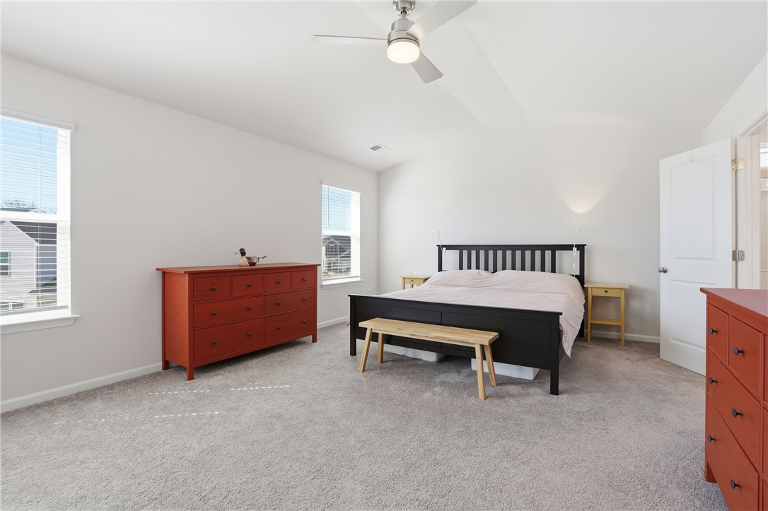 804 Spring Orchard Drive Lyman, SC 29365 - Photo 25 of 47 This tranquil bedroom offers comfort with a spacious layout and abundant natural light.