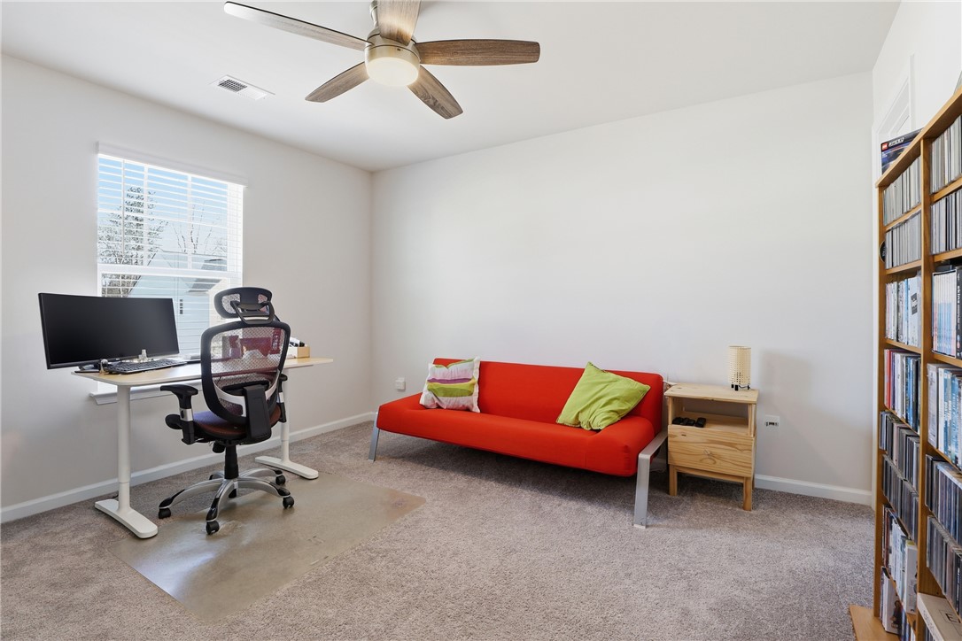 804 Spring Orchard Drive Lyman, SC 29365 - Photo 31 of 47 This versatile room offers a comfortable and functional living space.