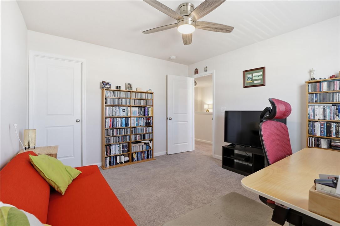804 Spring Orchard Drive Lyman, SC 29365 - Photo 32 of 47 This versatile room features comfortable carpeting, ample shelving, and a ceiling fan for year-round comfort.