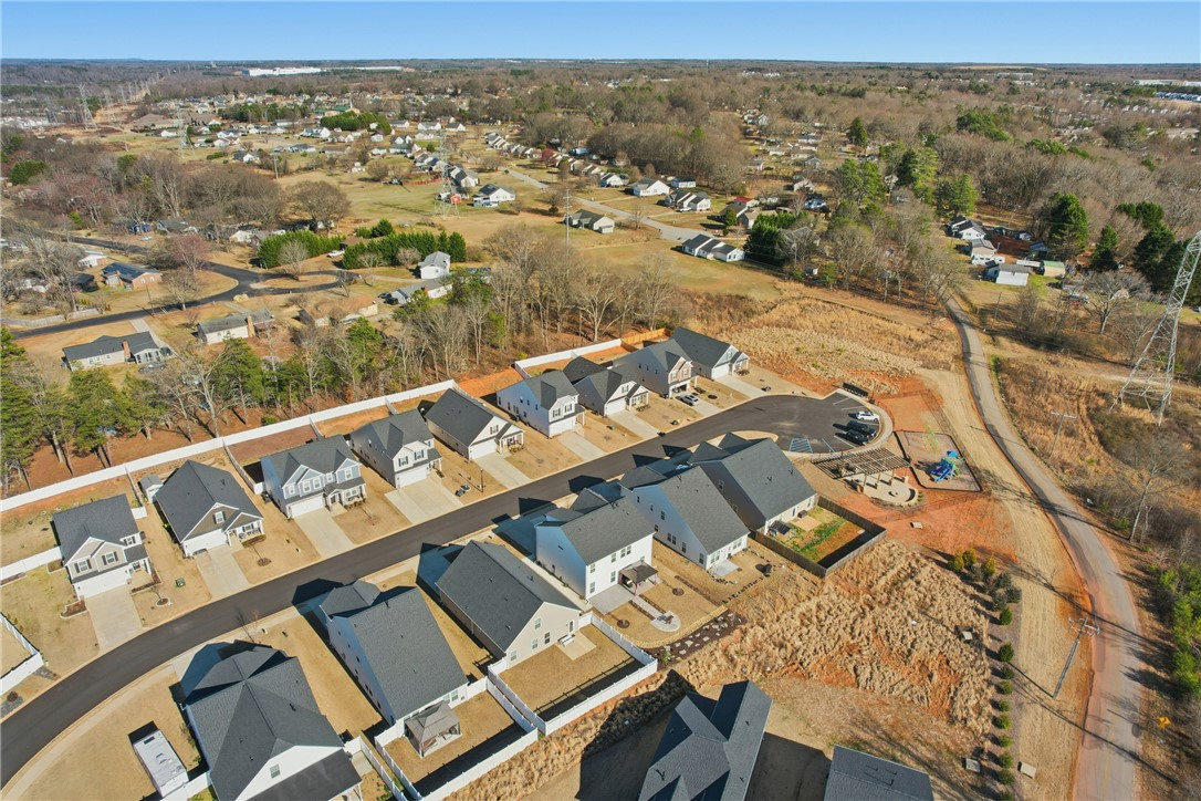804 Spring Orchard Drive Lyman, SC 29365 - Photo 39 of 47 This aerial view showcases a vibrant community with inviting homes and green spaces.