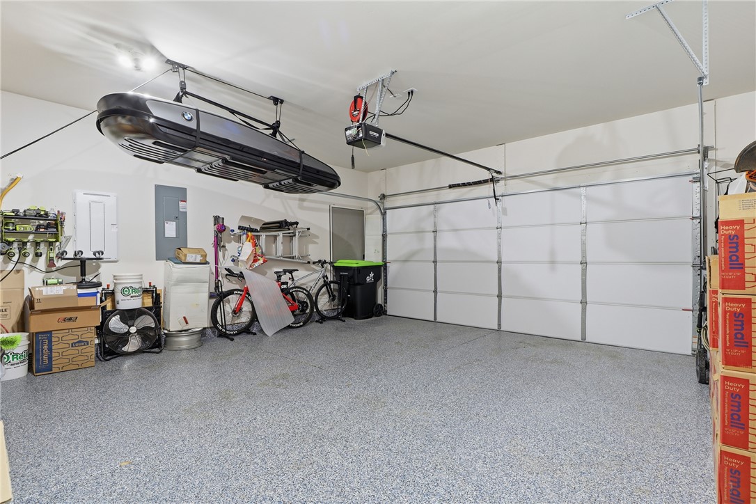 804 Spring Orchard Drive Lyman, SC 29365 - Photo 9 of 47 Epoxy-coated garage floor — durable, clean, and a major upgrade over builder concrete.