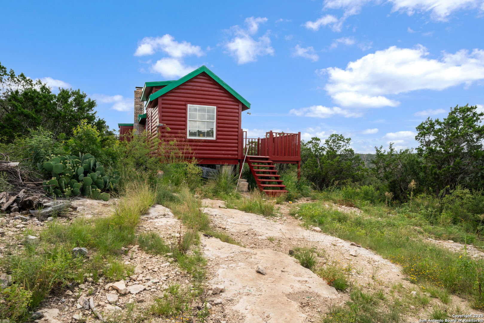 13693 Fm 1283 Mico, TX 78056 - Photo 24 of 26 a view of a house with a yard