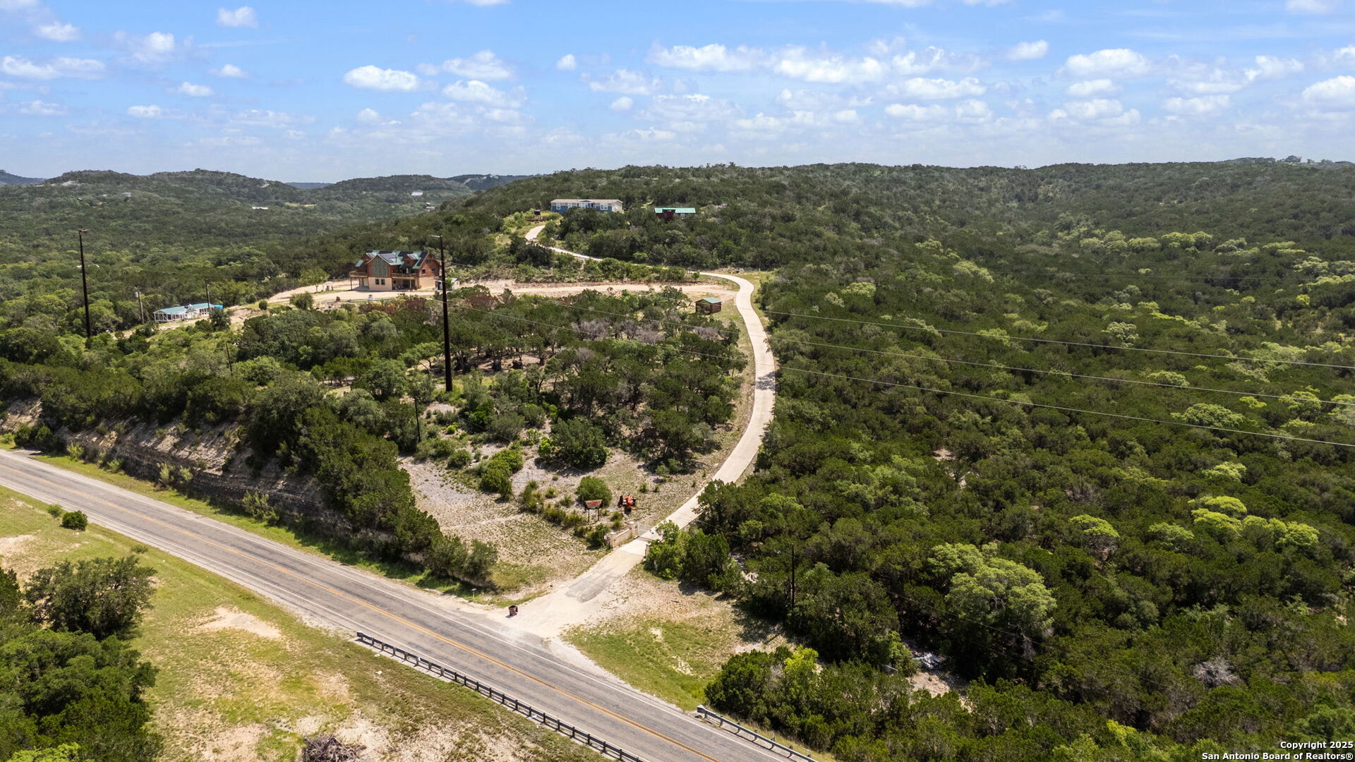 13693 Fm 1283 Mico, TX 78056 - Photo 6 of 26 a view of a lake from a window