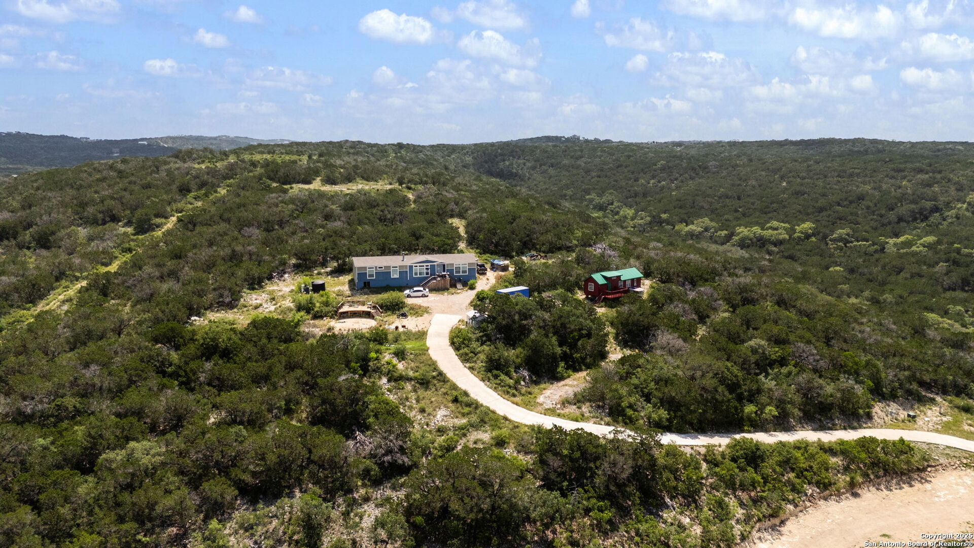 13693 Fm 1283 Mico, TX 78056 - Photo 7 of 26 a view of a city and mountains