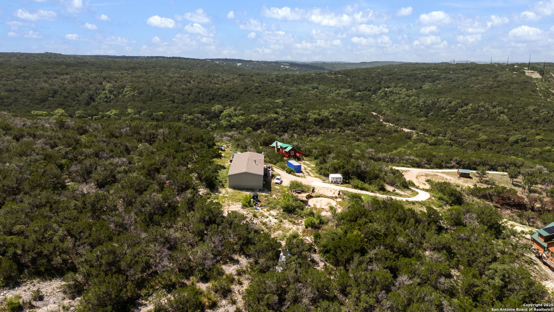 13693 Fm 1283 Mico, TX 78056 - Photo 9 of 26 a view of a lake with table and chairs