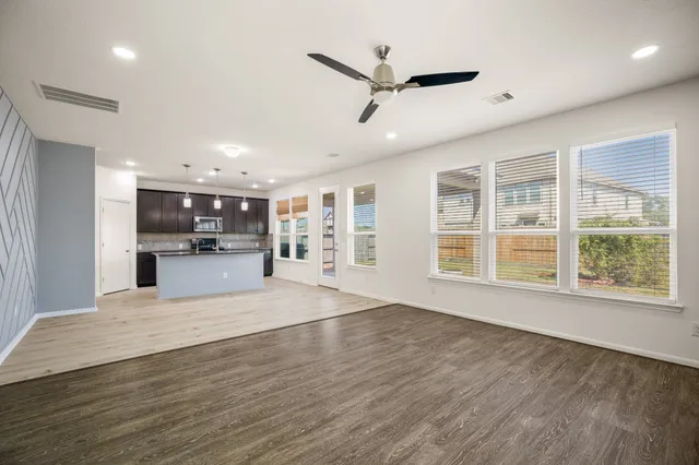 a view of kitchen and windows