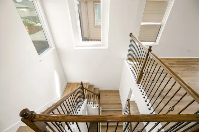 a view of balcony with wooden floor