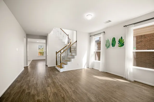 a view of entryway with wooden floor