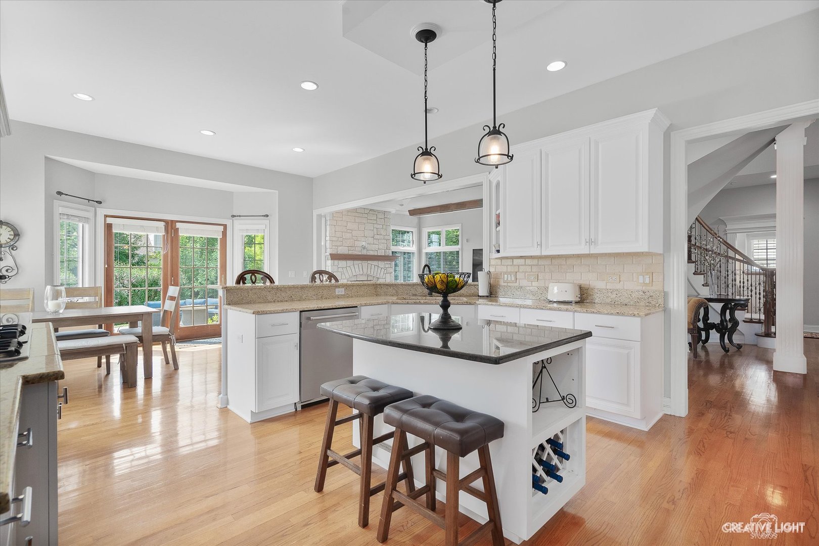 2334 Kane Lane Batavia, IL 60510 - Photo 11 of 34 a kitchen with counter space dining table and chairs