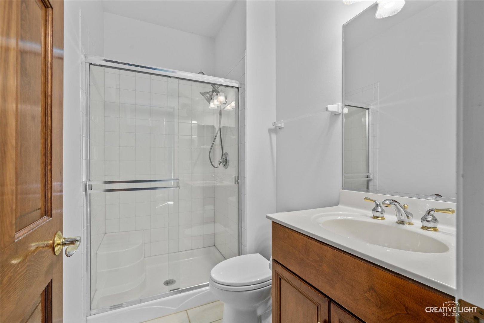 2334 Kane Lane Batavia, IL 60510 - Photo 25 of 34 a bathroom with a sink toilet and shower
