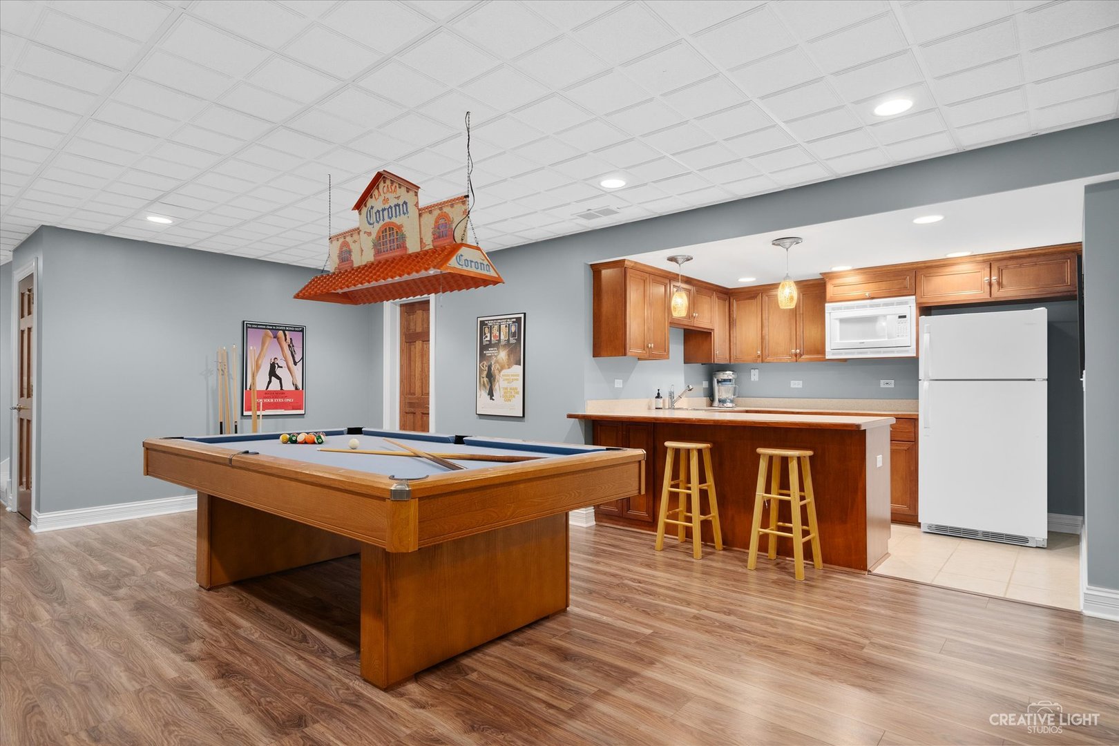 2334 Kane Lane Batavia, IL 60510 - Photo 27 of 34 a kitchen with stainless steel appliances granite countertop a stove and a wooden floors