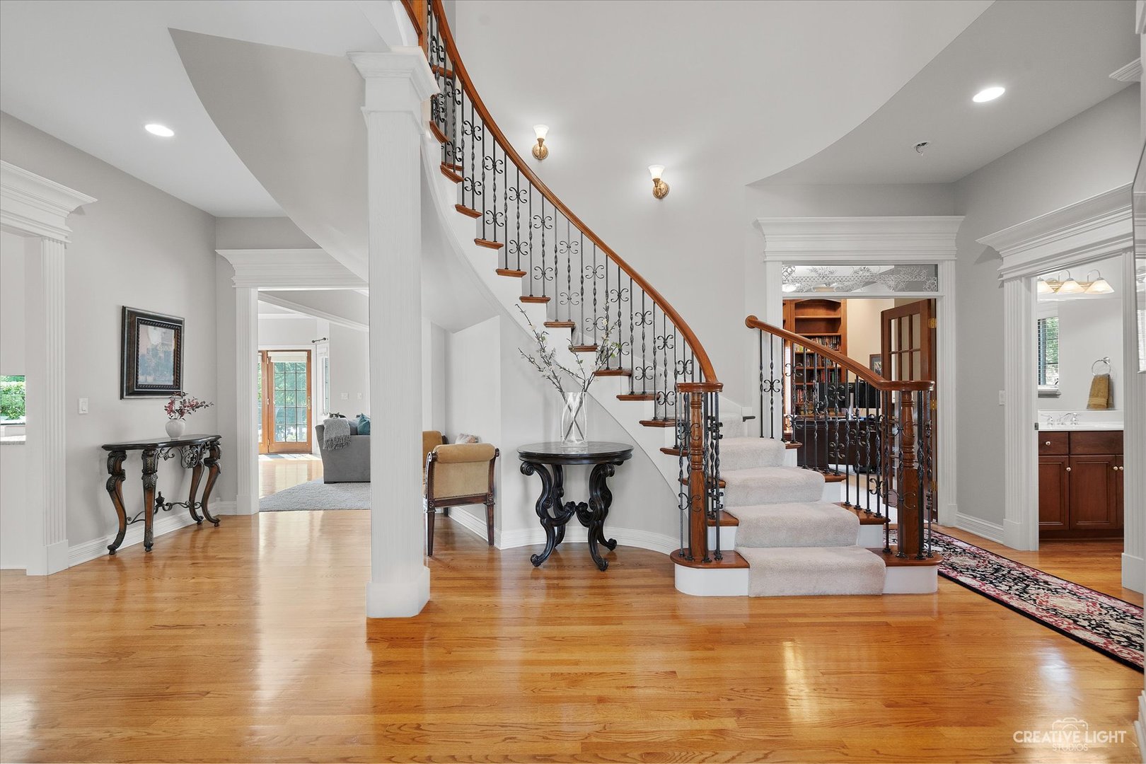 2334 Kane Lane Batavia, IL 60510 - Photo 5 of 34 a view of entryway and hall with wooden floor