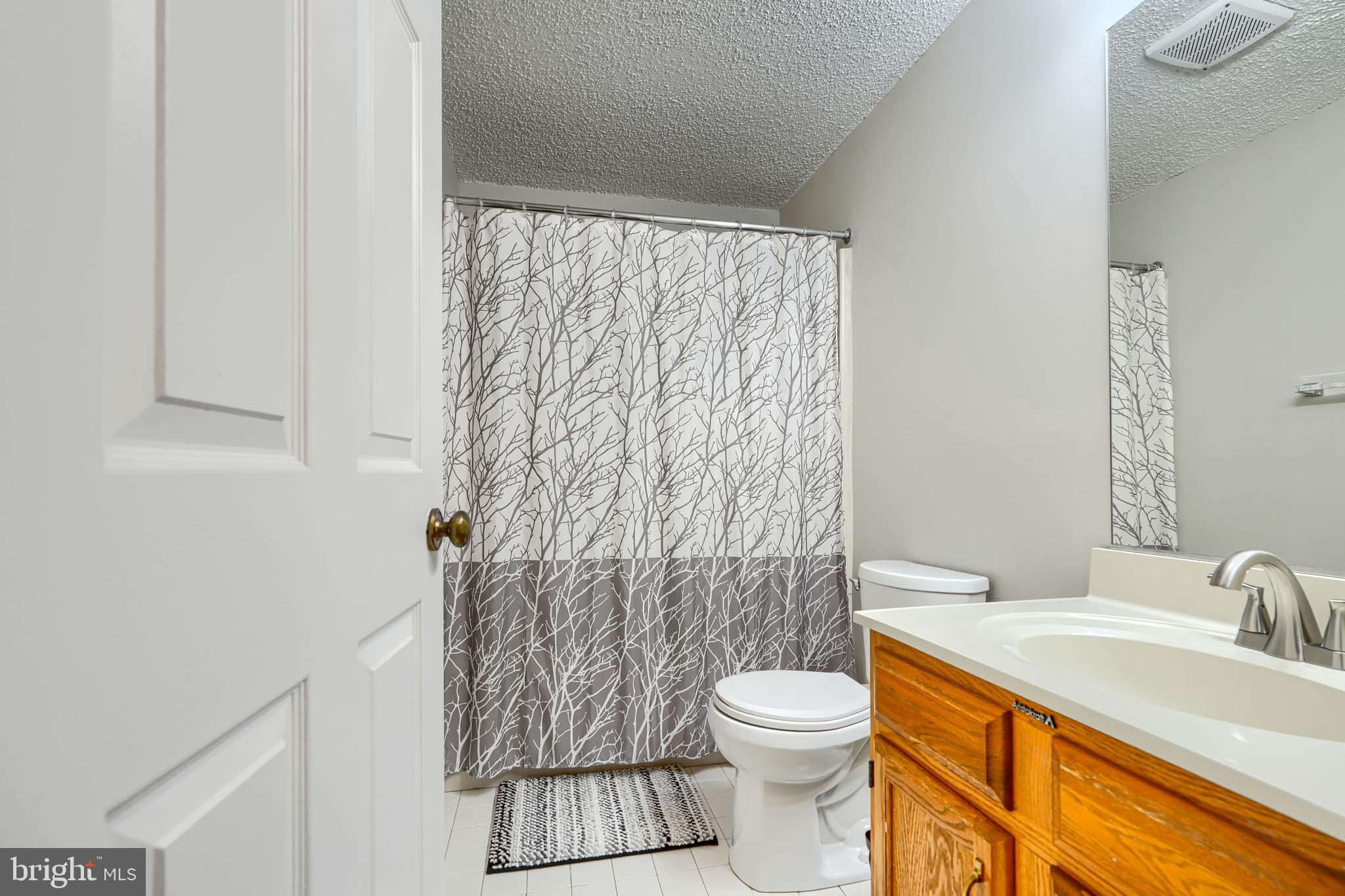 12 Jacobo Lane Baltimore, MD 21239 - Photo 37 of 73 Upper Level Main Bathroom