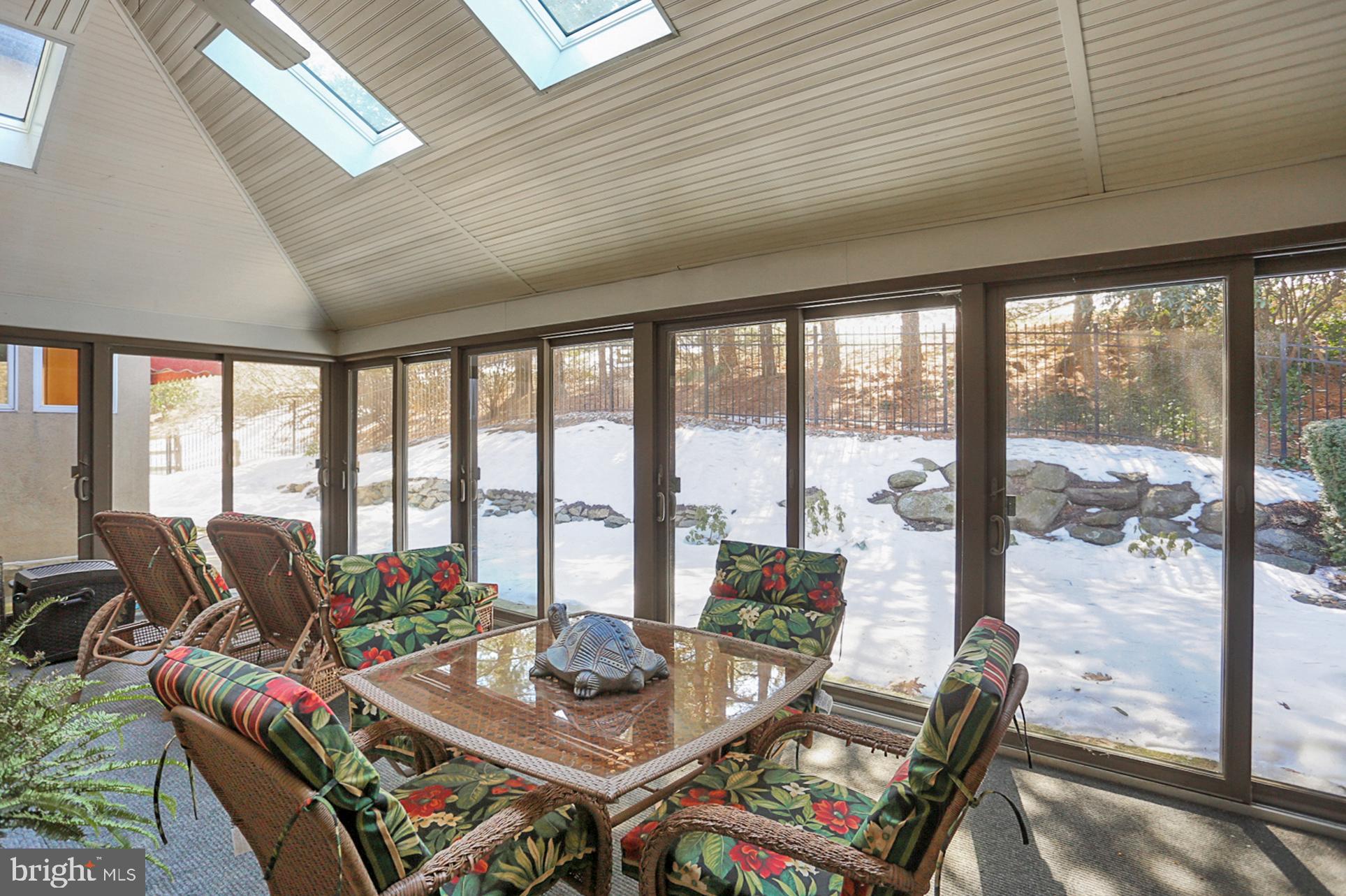 101 Robert Drive Reading, PA 19610 - Photo 89 of 118 a living room with furniture and floor to ceiling windows