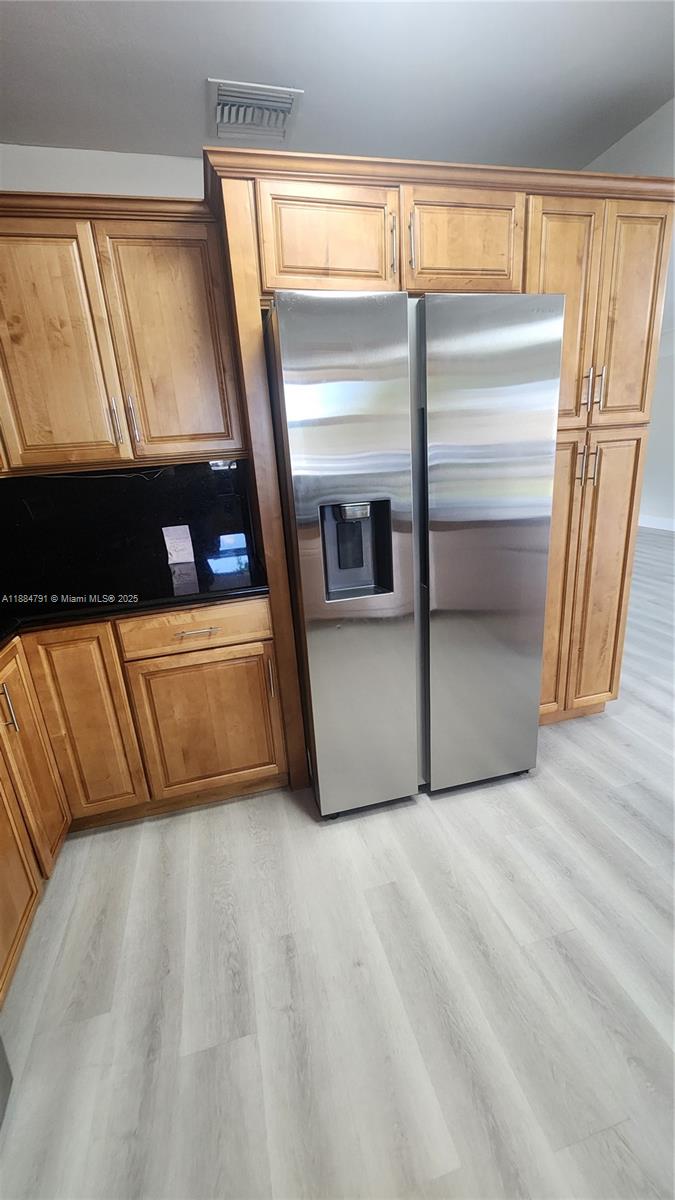 3295 Northwest 214th Street, Unit 3295 Miami Gardens, FL 33056 - Photo 11 of 19 a view of a living room with a large window