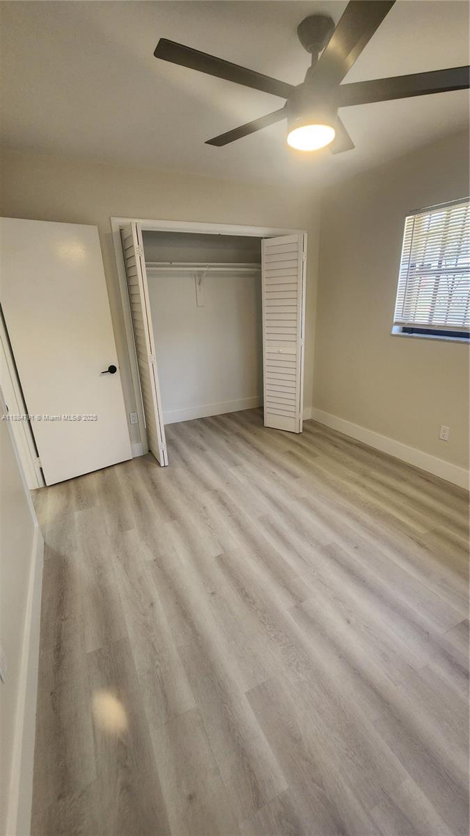 3295 Northwest 214th Street, Unit 3295 Miami Gardens, FL 33056 - Photo 14 of 19 a view of an empty room