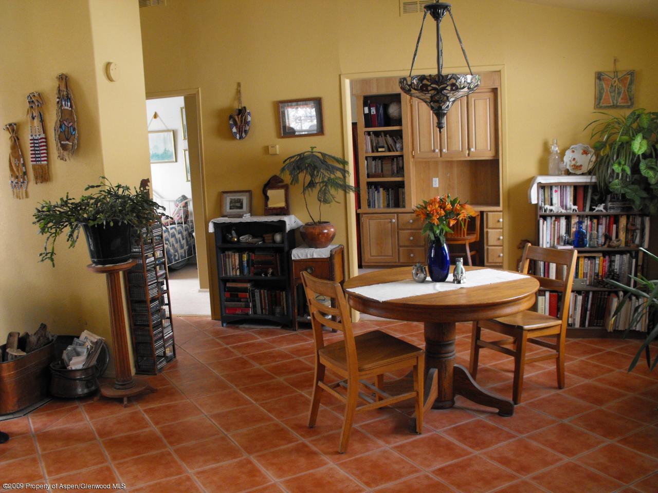 1225 County Road 226 Rifle, CO 81650 - Photo 2 of 22 a view of a dining room with furniture