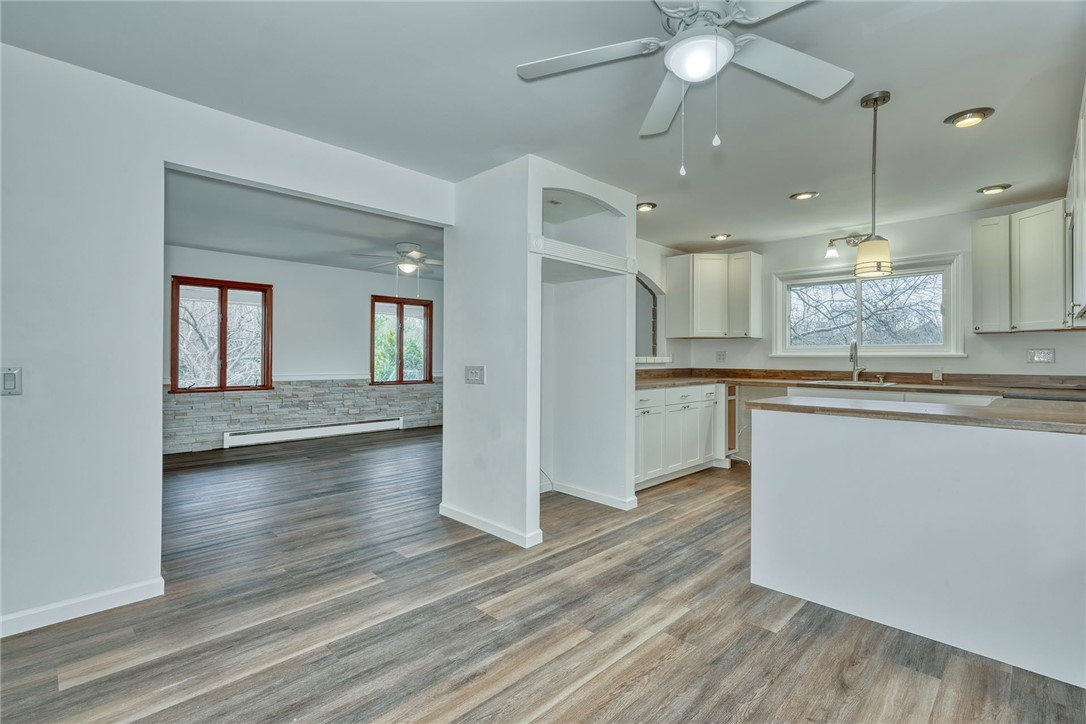 147 Basket Road Webster, NY 14580 - Photo 15 of 49 KITCHEN OPENS TO FORMAL DINING
