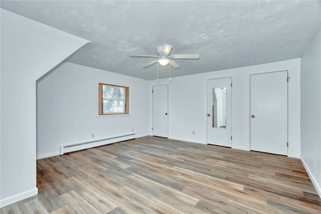 147 Basket Road Webster, NY 14580 - Photo 25 of 49 2ND FLR - PRIMARY BEDROOM W/NEW LUXURY FLOORING *2