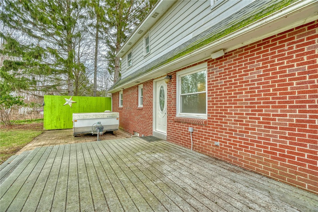 147 Basket Road Webster, NY 14580 - Photo 40 of 49 TREX DECK - REAR ENTRANCE TO KITCHEN