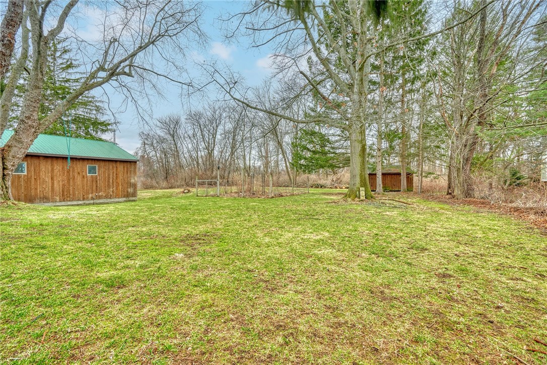 147 Basket Road Webster, NY 14580 - Photo 41 of 49 DECK VIEW OF THE BACKYARD