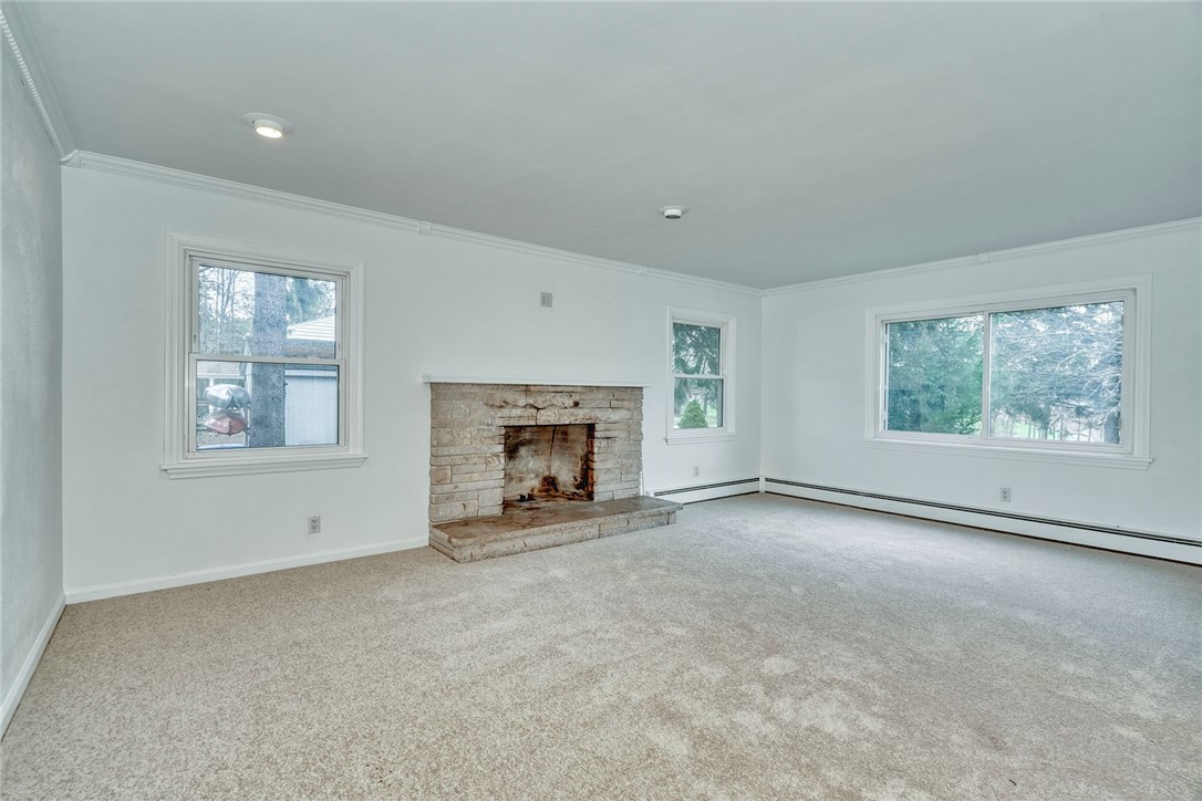 147 Basket Road Webster, NY 14580 - Photo 6 of 49 GREAT ROOM W/STONE FIREPLACE * NEW CARPETING (OVER