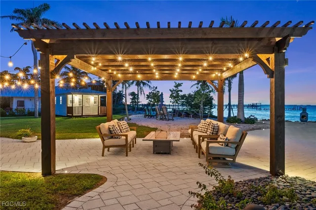 a view of a chairs and table in patio