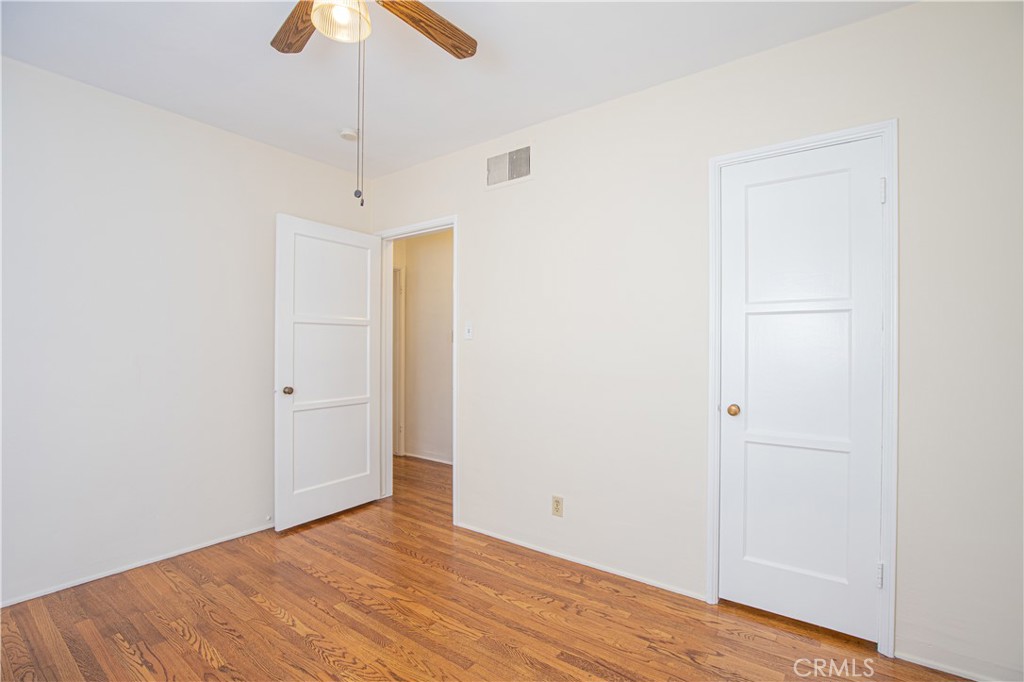 1562 Riverside Drive Glendale, CA 91201 - Photo 13 of 21 a view of an empty room with wooden floor