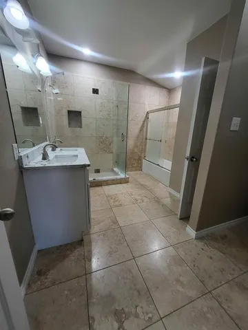 a view of a kitchen with a sink