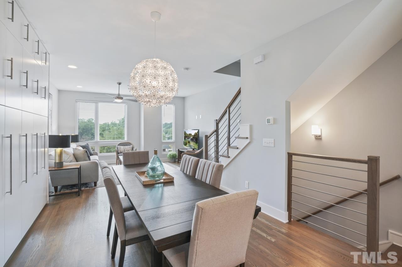 514 West South Street Raleigh, NC 27601 - Photo 17 of 41 a view of a dining room with furniture window and wooden floor