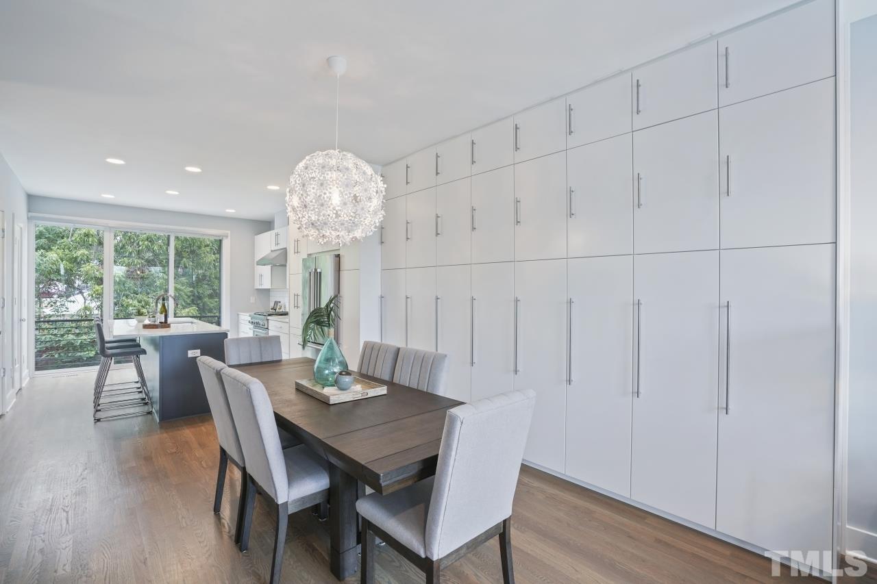 514 West South Street Raleigh, NC 27601 - Photo 18 of 41 a view of a dining room with furniture window and wooden floor